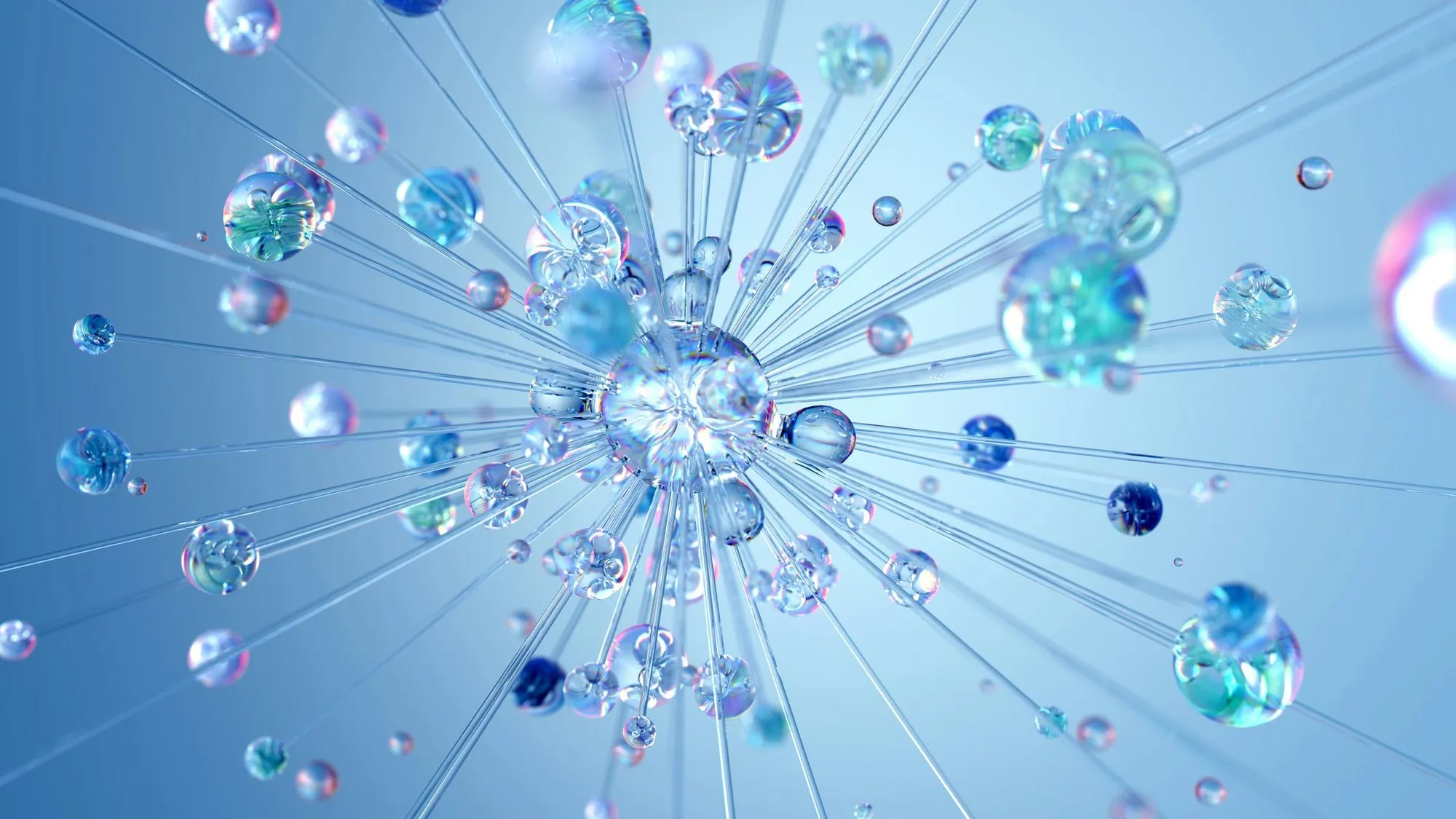 Glass spheres and droplets on thin rods radiating from a center against a blue background