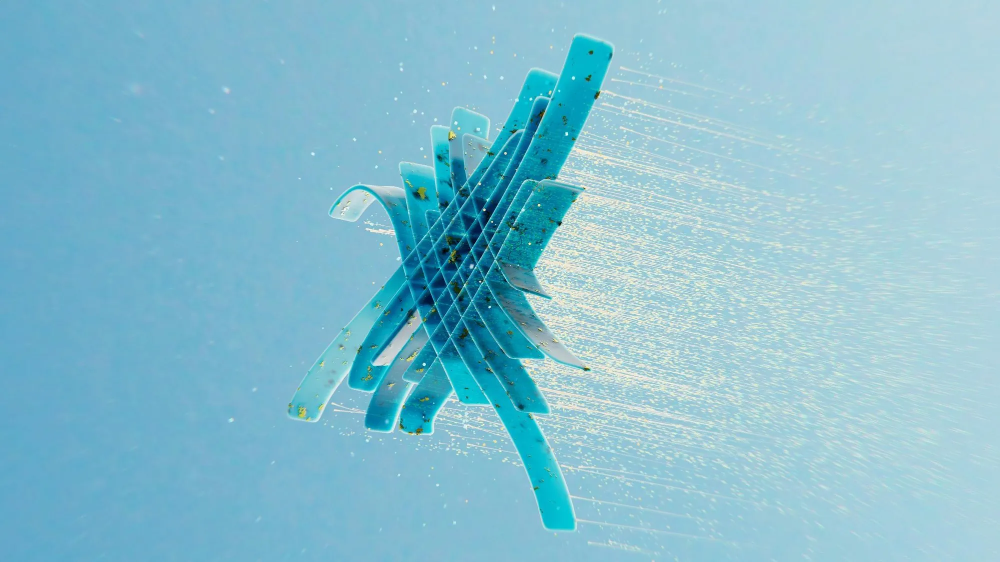 Translucent blue ribbons crossing each other in a fine spray of water on a light blue background